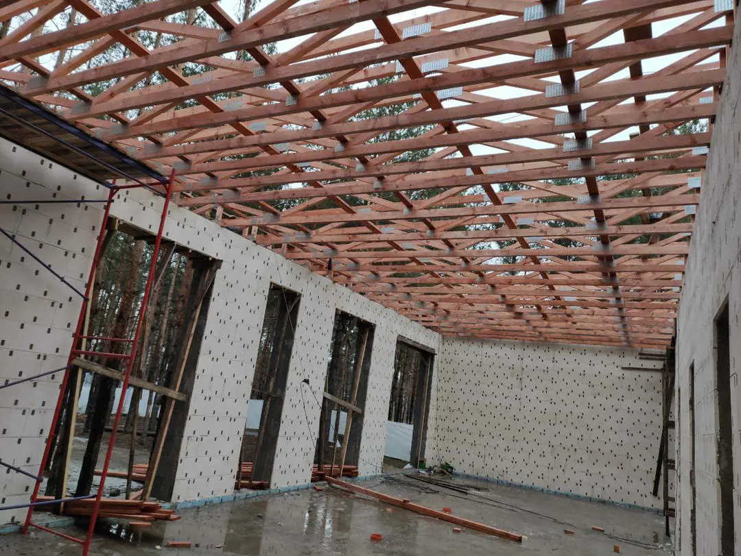 Interior view of Riviera Passive House Block walls and roof structure under construction